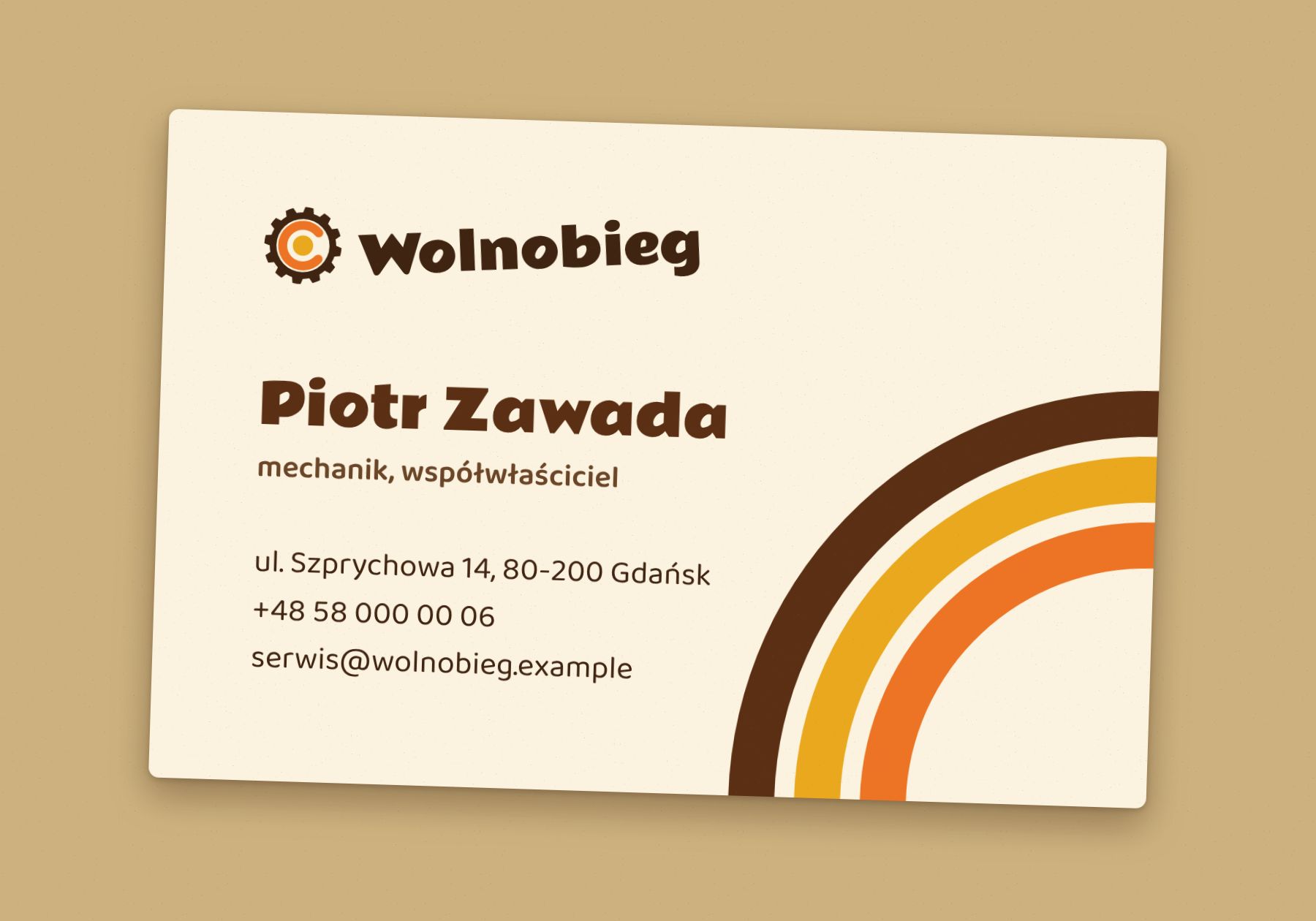 Rewers wizytówki Wolnobiegu z nazwiskiem mechanika, adresem i telefonem.